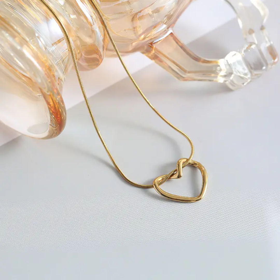 Liquid Love: The Sculptural Heart Pendant & Earring Set