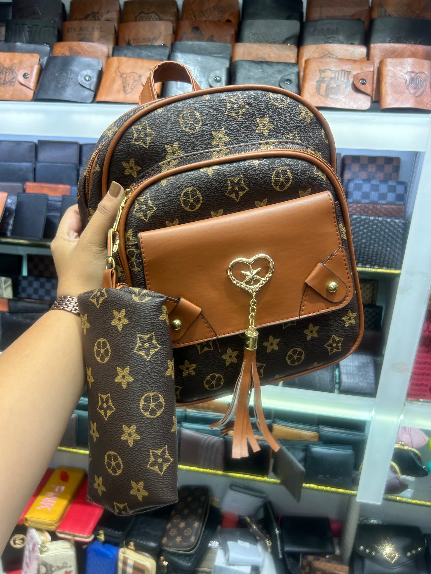 Chic & Playful Monogram Mini Backpack with Tassel Charm