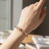Signature Rose-Toned Multi-Heart Bracelet – Premium Edition
