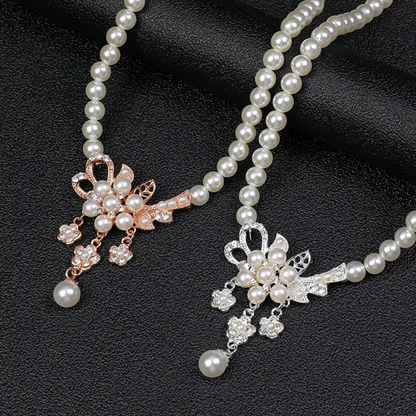 Elegant Pearl and Crystal Floral Necklace and Earring Set Silver