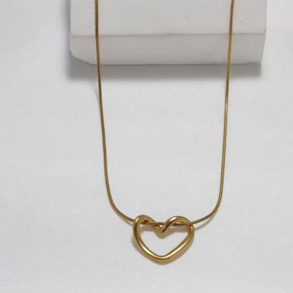 Liquid Love: The Sculptural Heart Pendant & Earring Set