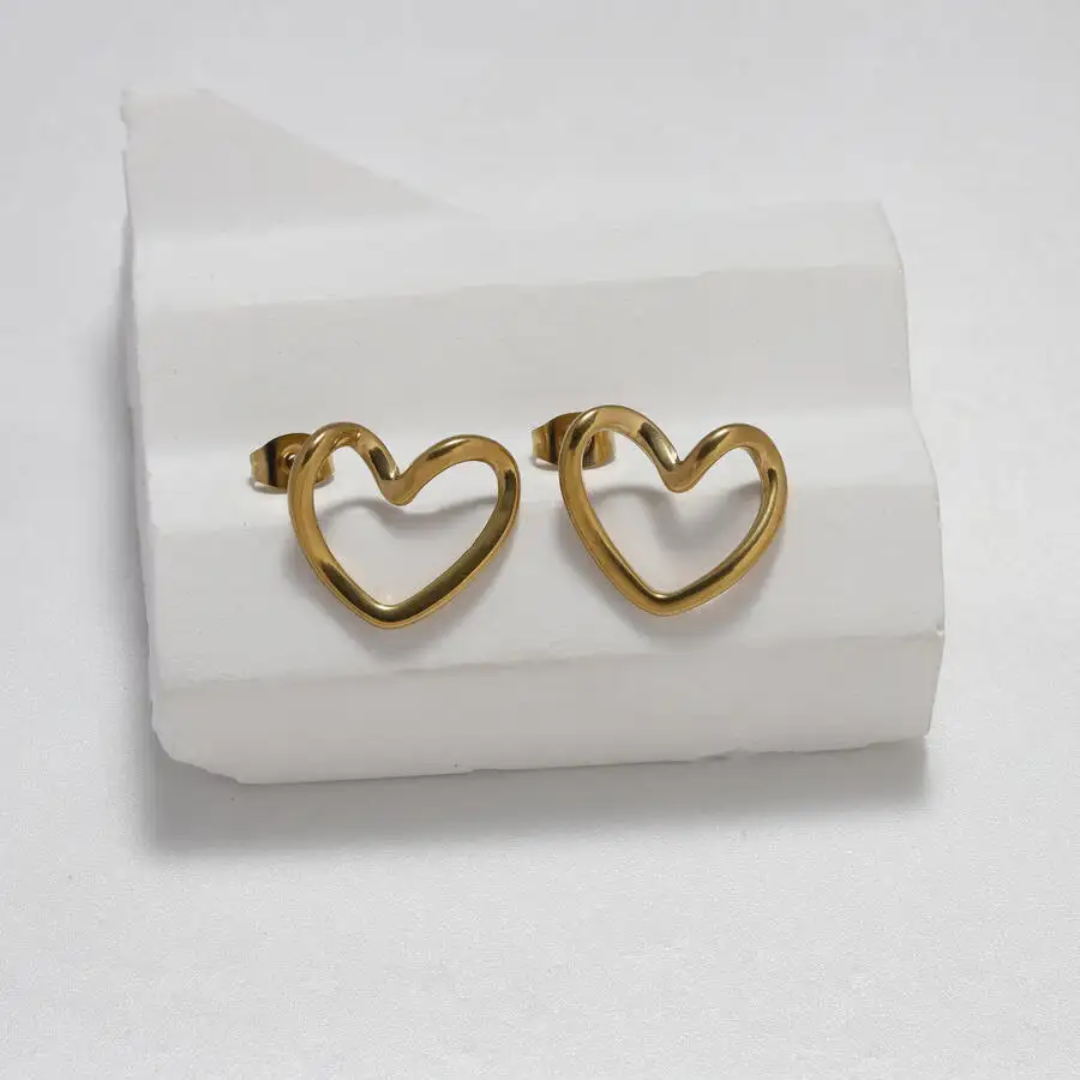 Liquid Love: The Sculptural Heart Pendant & Earring Set