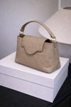 Gemini said The Signature Monogram Elite Satchel