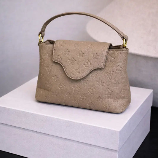 Gemini said The Signature Monogram Elite Satchel