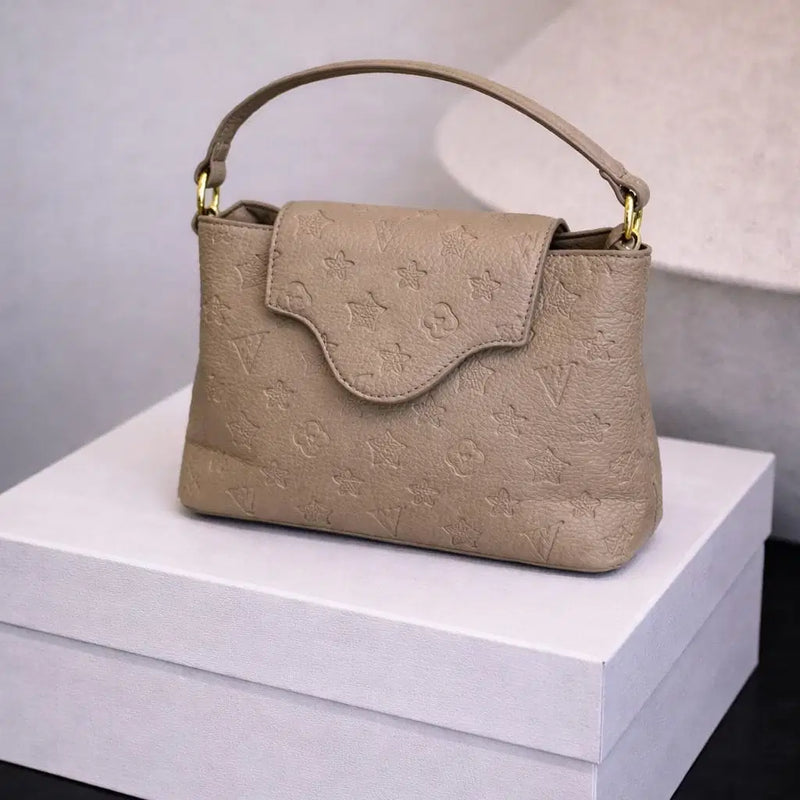 Gemini said The Signature Monogram Elite Satchel