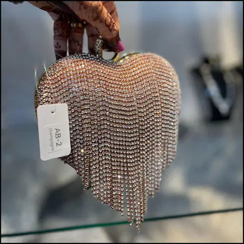 Beaded handbag with a visible tag on a blurred background