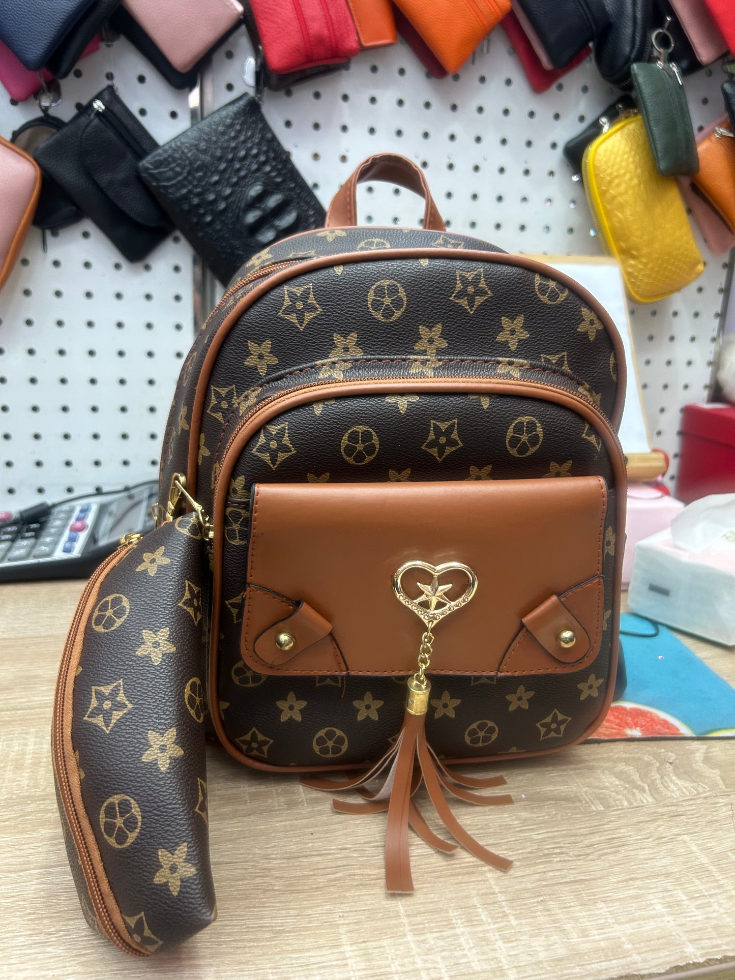 Chic & Playful Monogram Mini Backpack with Tassel Charm