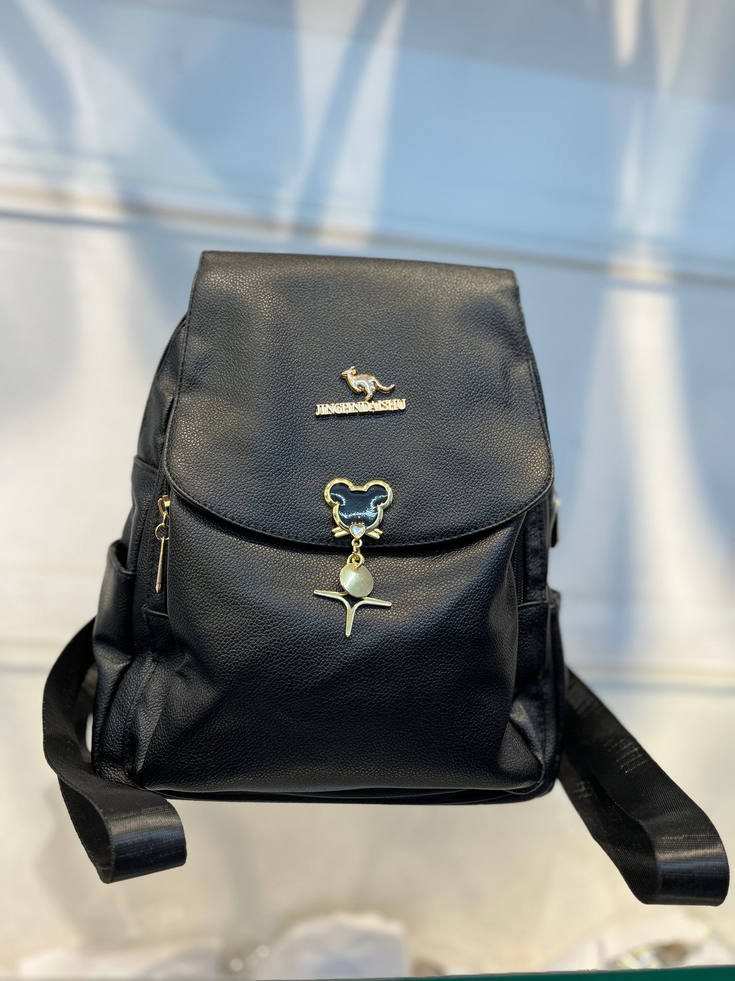 Elegant Faux Leather Women's Backpack with Charms