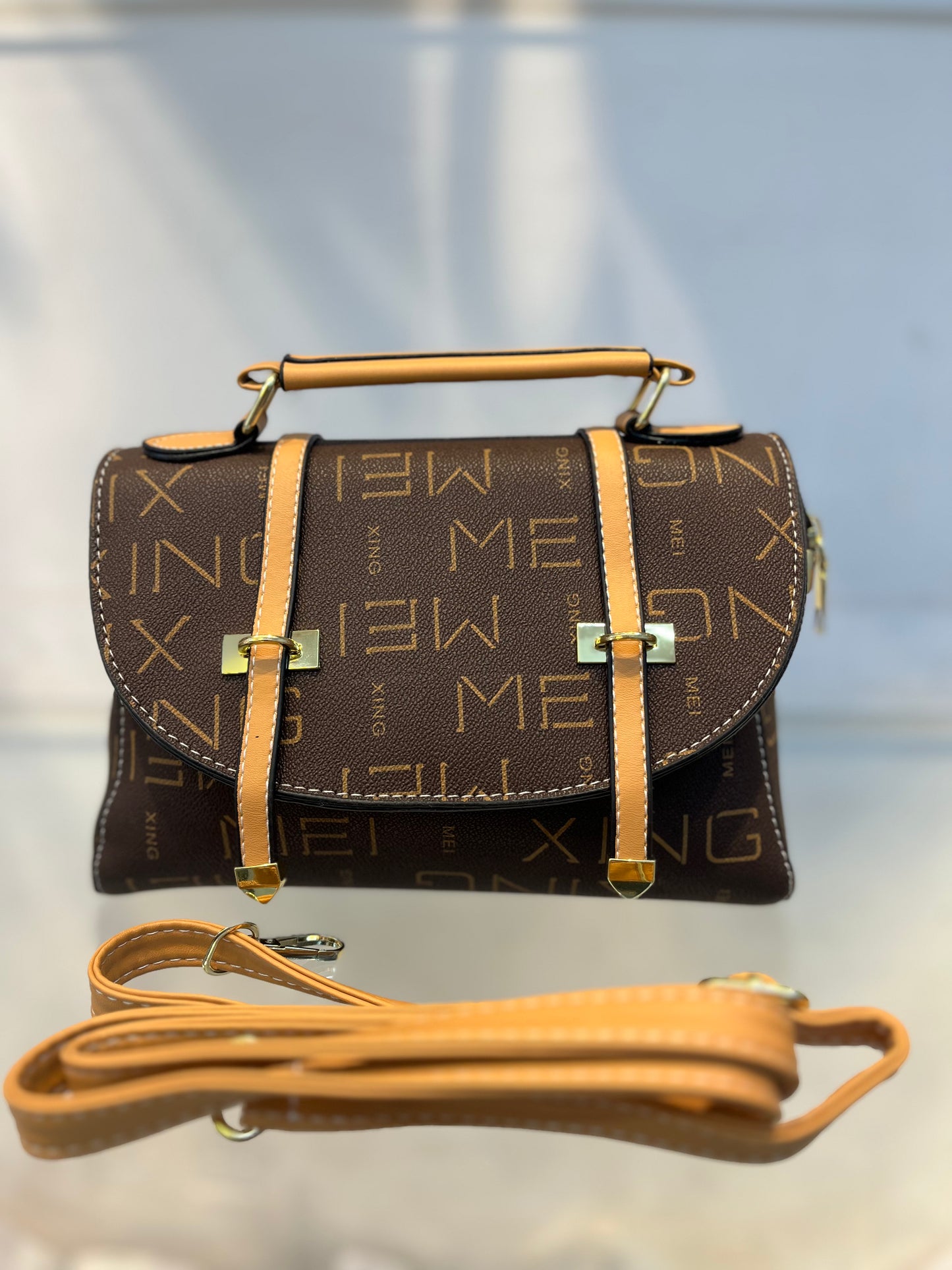 Brown MEI Pattern Faux Leather Handbag with Two Strips