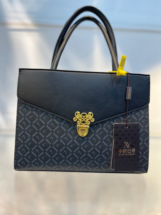 Elegant Monogram Leather Handbag – Black & Gold Accent