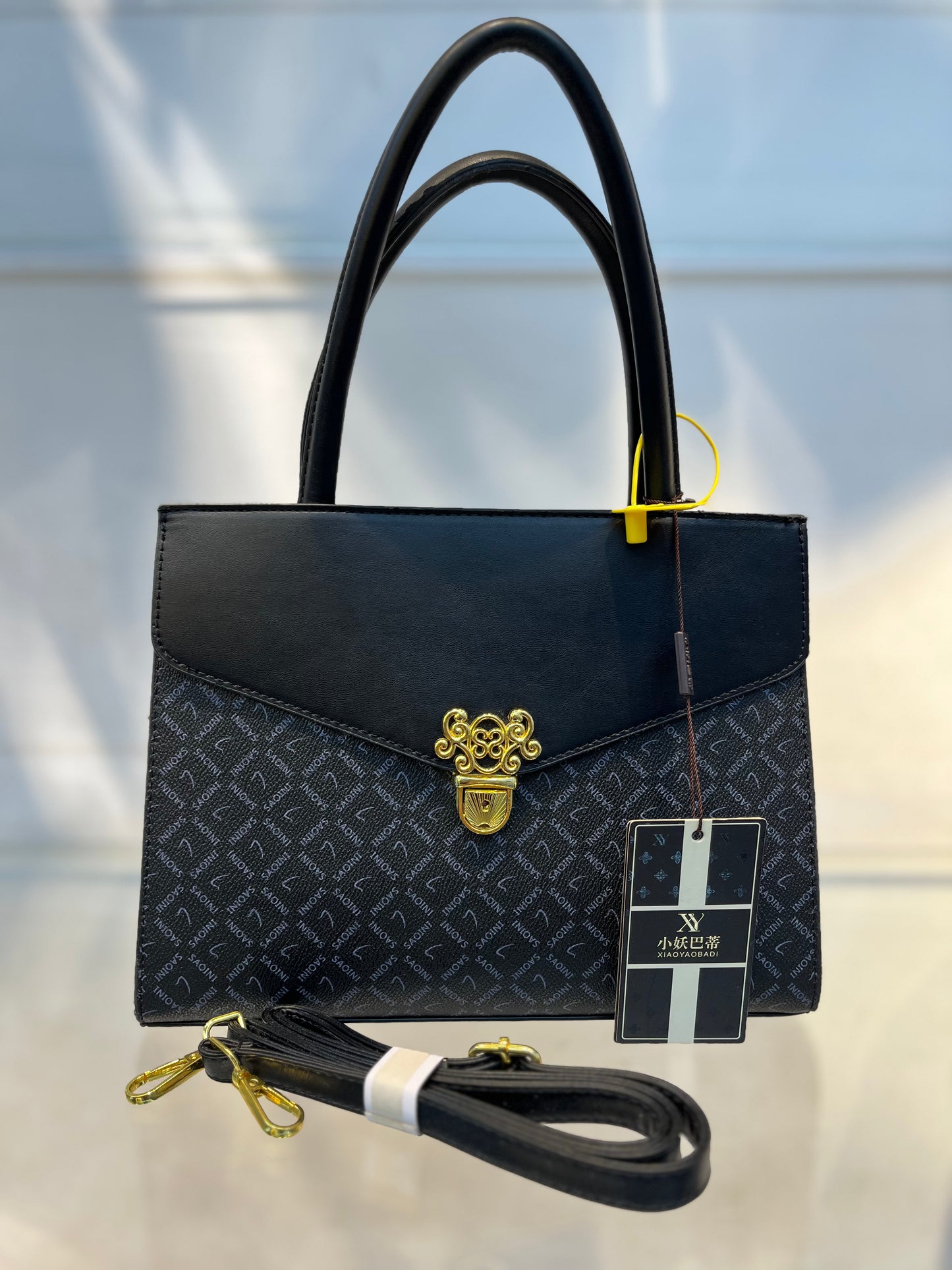 Elegant Monogram Leather Handbag – Black & Gold Accent