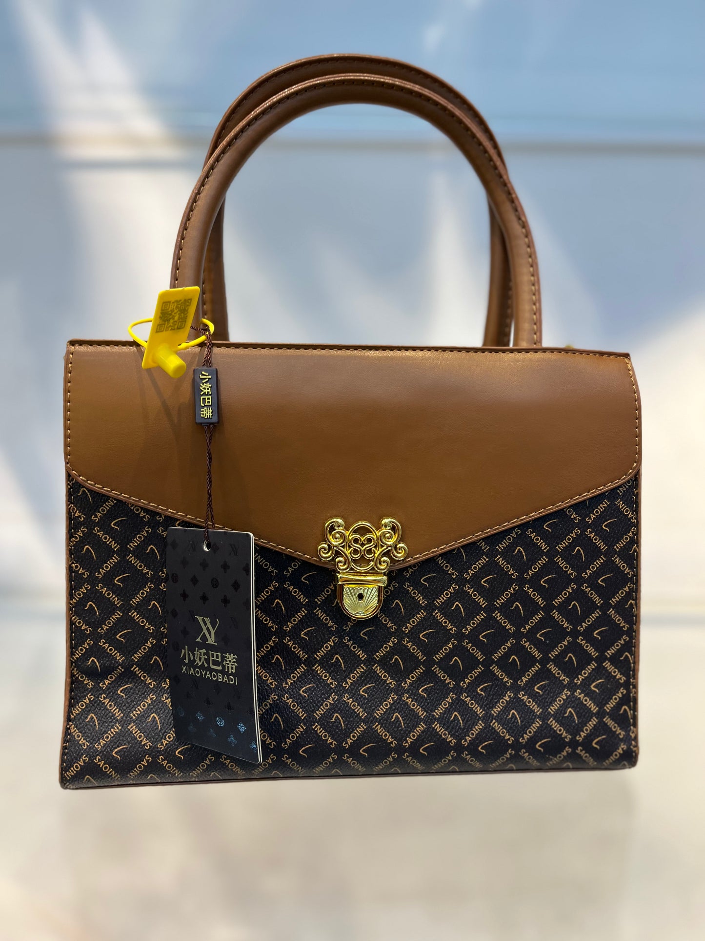 Elegant Monogram Leather Handbag – Brown & Gold Accent