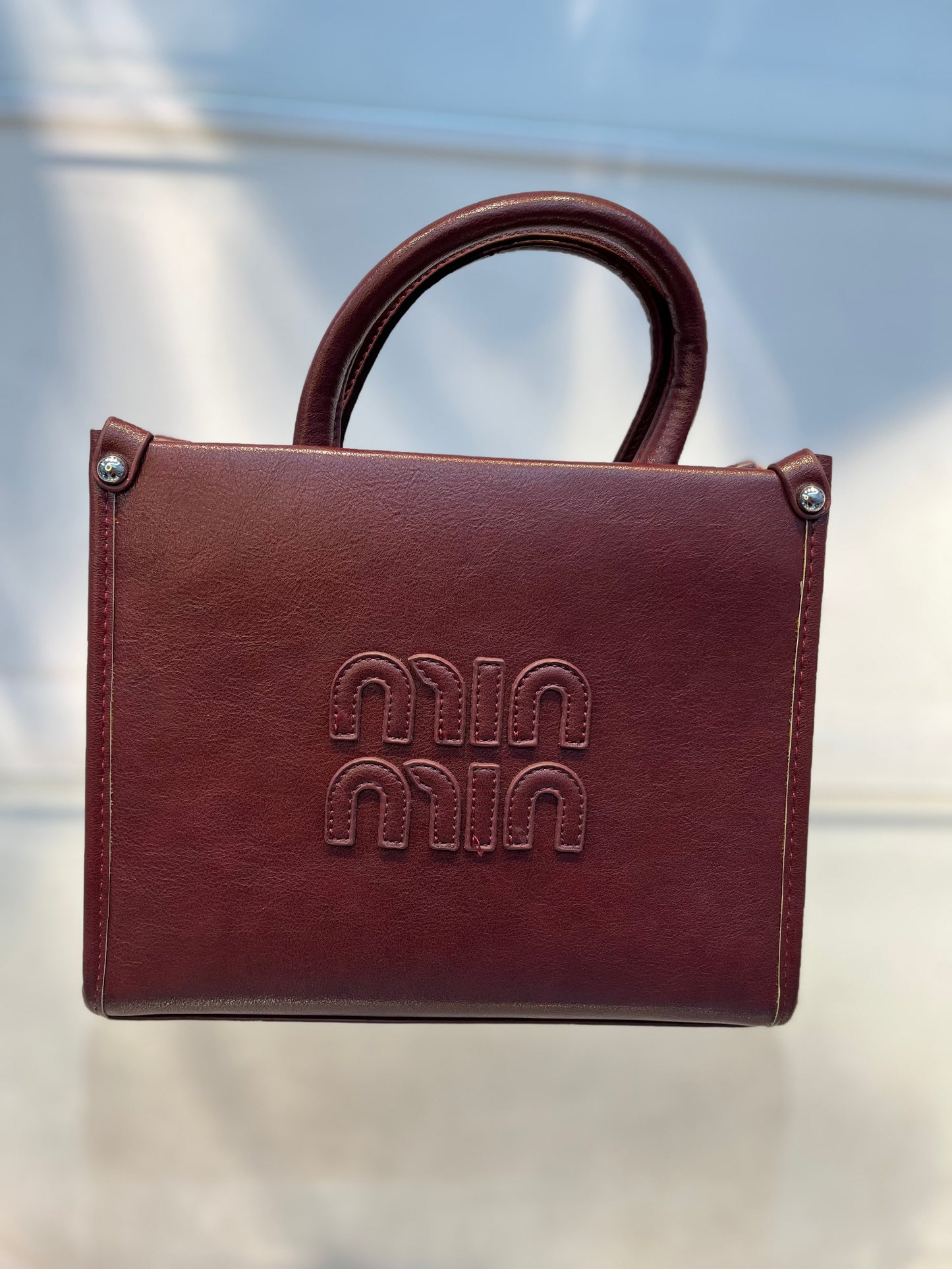 Minmin Claret Shade Faux Leather Handbag with Sling