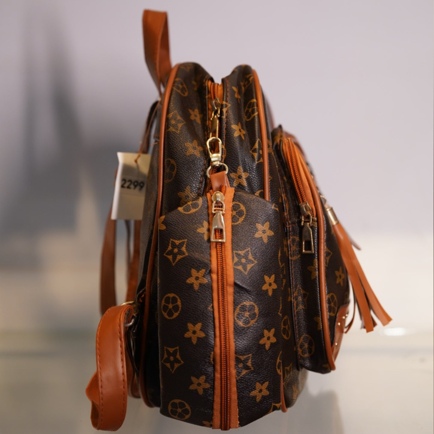 Chic & Playful Monogram Mini Backpack with Tassel Charm