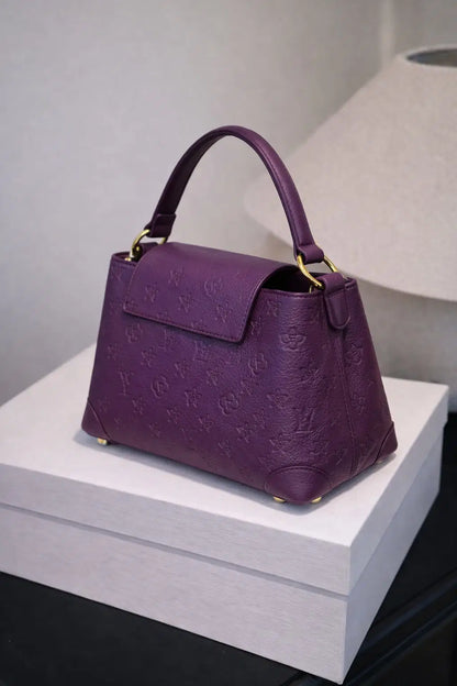 The Amethyst Heritage Monogram Satchel